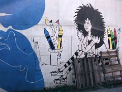 07D The black and white girl and crayons by Dewayne Webb Paint Jamaica street art in Kingston Jamaica